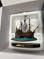Ship figurine in Styrofoam with stand visible