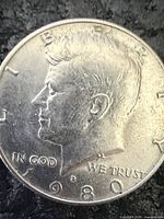 Obverse showing JFK profile, year 1980 and D mint mark