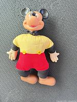 Full front view of Mickey Mouse doll