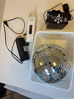 Disco ball, rotation motor, boxed battery motor, LED party light laid out