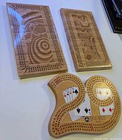 Front view of all three bamboo cribbage boards