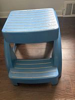 Front/top view showing two steps, non-slip treads, Mistral name