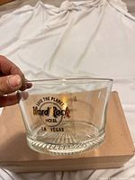 Side view of glass ice bucket showing gold Hard Rock Hotel Las Vegas decal and accompanying box