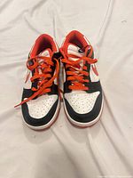 Top view of both sneakers showing color scheme and laces