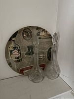 Pair of cut glass decanters with stoppers front view