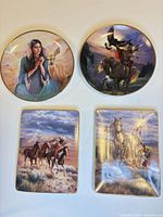 All four metal plaques laid out