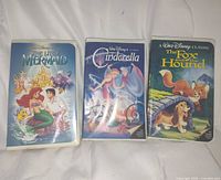 Front view of all three Disney VHS tapes