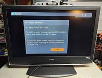 Front view of Sony KDL-40S2010 TV powered on showing menu