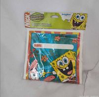 Front view of sealed package showing SpongeBob SquarePants themed gift bags