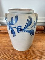 Full view of crock front showing cobalt decoration and lug handles