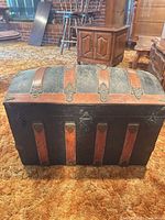 Front and slatted lid view of steamer trunk