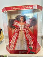 Front view of boxed Happy Holidays Barbie doll