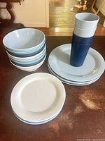 Full set stacked showing cups, plates, bowls