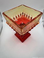 Overall view of square footed compote showing color gradient and pattern