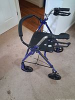 Full view of purple Drive rollator walker