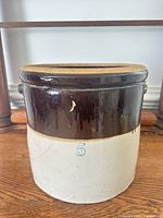 Full view of two-tone crock showing size, handles and numeral