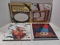 Four LPs: Matching Tie and Handkerchief, Flying Circus, The Final Rip Off, stage curtain cover LP
