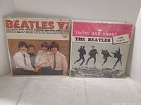Front covers of both Beatles LPs