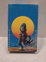 front of display box showing artwork and series info