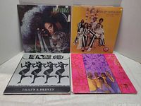 Front covers of Diana Ross, The 5th Dimension, The Pointer Sisters, The Emotions albums