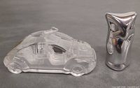 Crystal VW Beetle and aluminum owl side by side