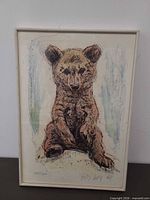 Full view of framed bear cub print