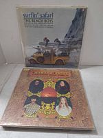 Front covers Beach Boys “Surfin’ Safari” and Mamas & Papas LPs