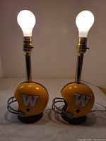 Full view of both helmet lamps lit