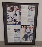 Frontal view of framed autographed poster