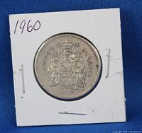 Reverse of 1960 50 cent coin in holder