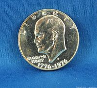 obverse showing Eisenhower portrait, LIBERTY legend, dual date