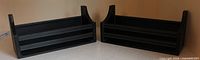 Full view of both black leather desk organizers side by side