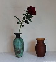 Both vases side by side showing relative sizes and colors