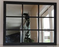 Front view of 9-pane mirror displaying frame and pane layout