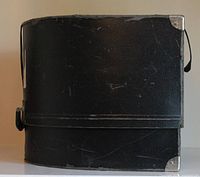 Side view of closed case highlighting textured exterior and corner protectors