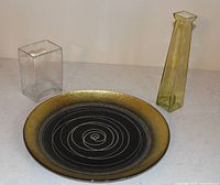 All three items: platter, green vase, clear vase