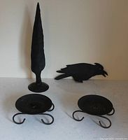 All four wrought-iron pieces grouped together