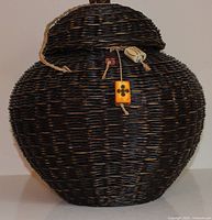 Full view of rattan basket with lid on