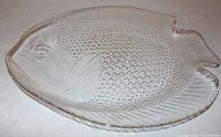 full view of clear glass fish platter