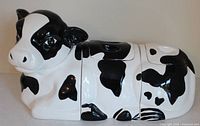 Full assembled cow canister set side view