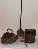 Entire lot showing shovel, bucket, wicker basket of pine cones, deer antler
