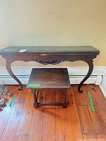 Front view of console table and stool showing design and overall appearance