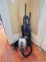 Kenmore canister, Royal upright, hose and tools grouped in corner