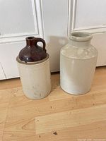 Front view of both crocks showing form and relative size