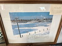 Full view of framed print with mat and identification card