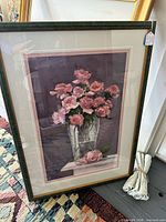 Full view of framed watercolor of pink roses in vase
