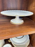 Side view showing full pedestal cake stand