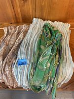 All three scarves laid out