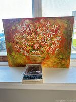 Full view of daisy painting with frame boxed in front