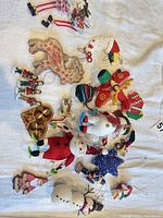 Group shot of all ornaments on white cloth